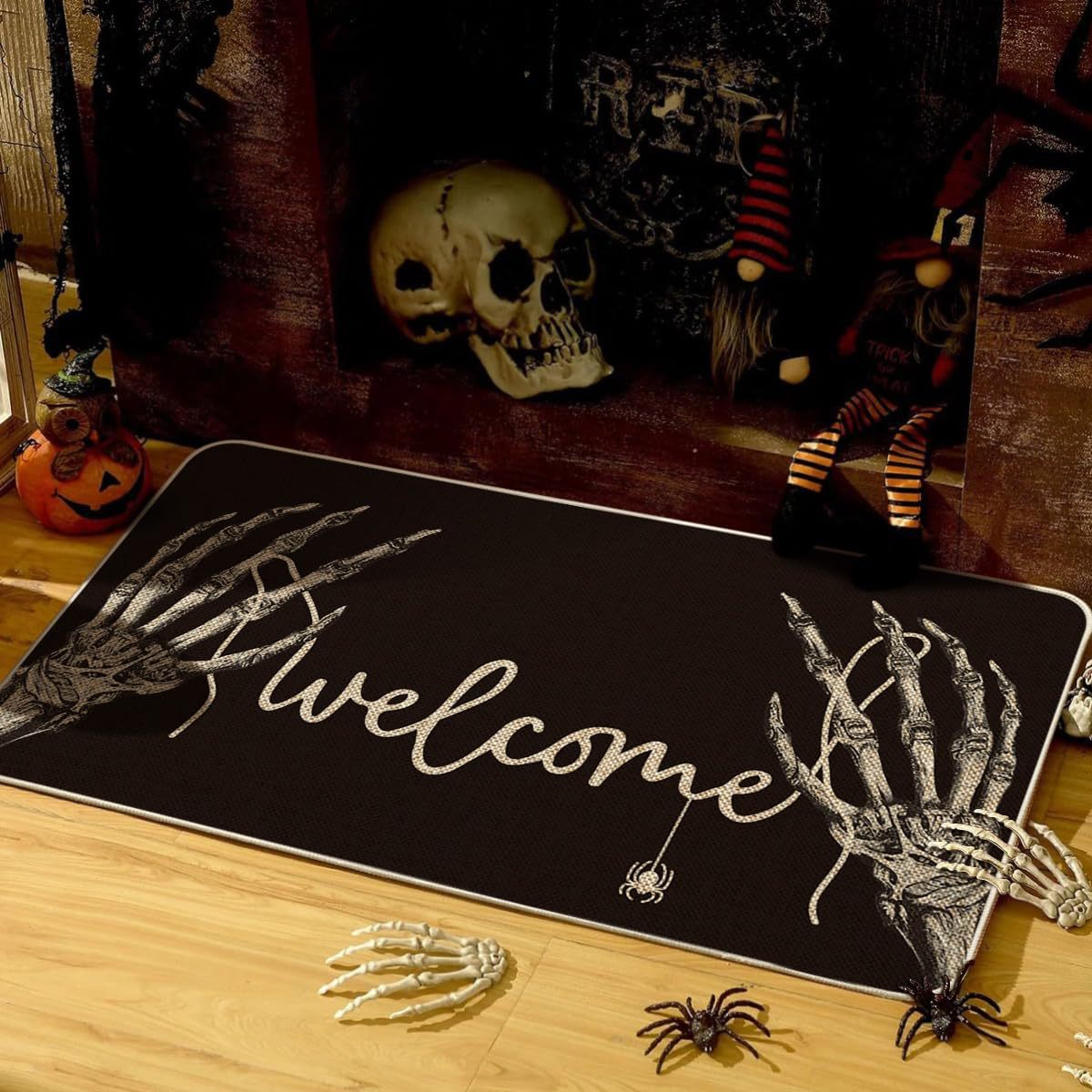 Halloween-themed doormat with skeleton hands and 'welcome' text, surrounded by decorative items.
