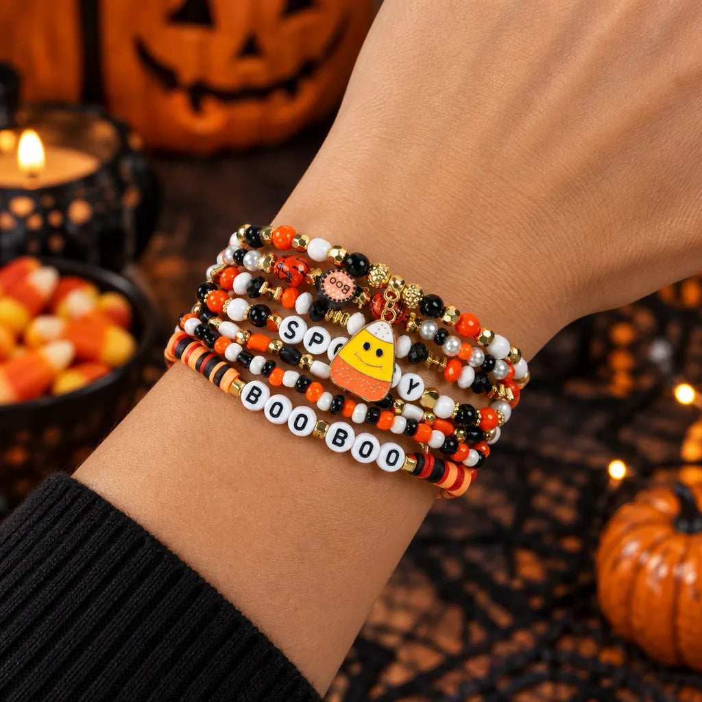 Spooky charm Halloween beaded bracelet – pumpkin, ghost and skull pendant jewelry