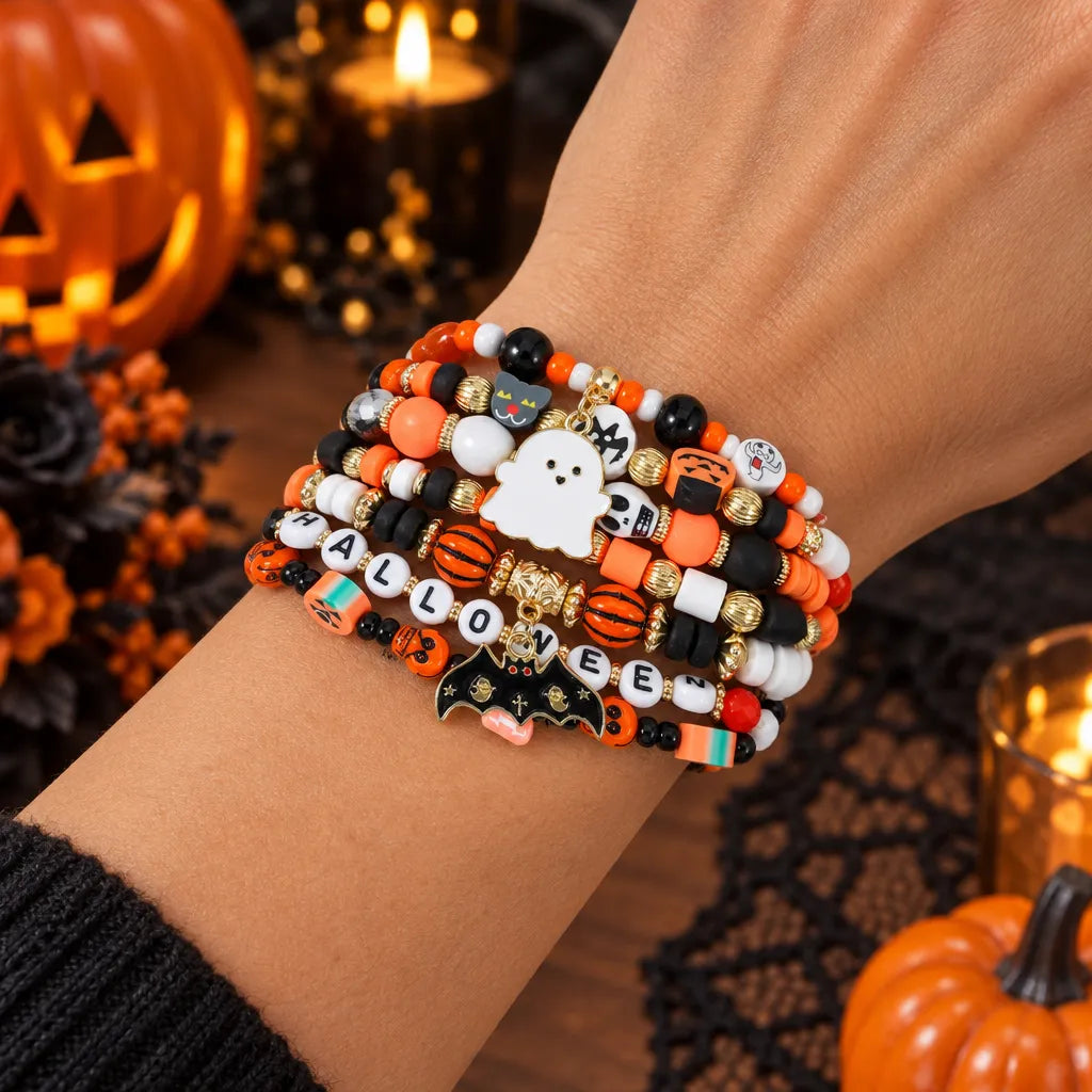 Spooky charm Halloween beaded bracelet – pumpkin, ghost and skull pendant jewelry