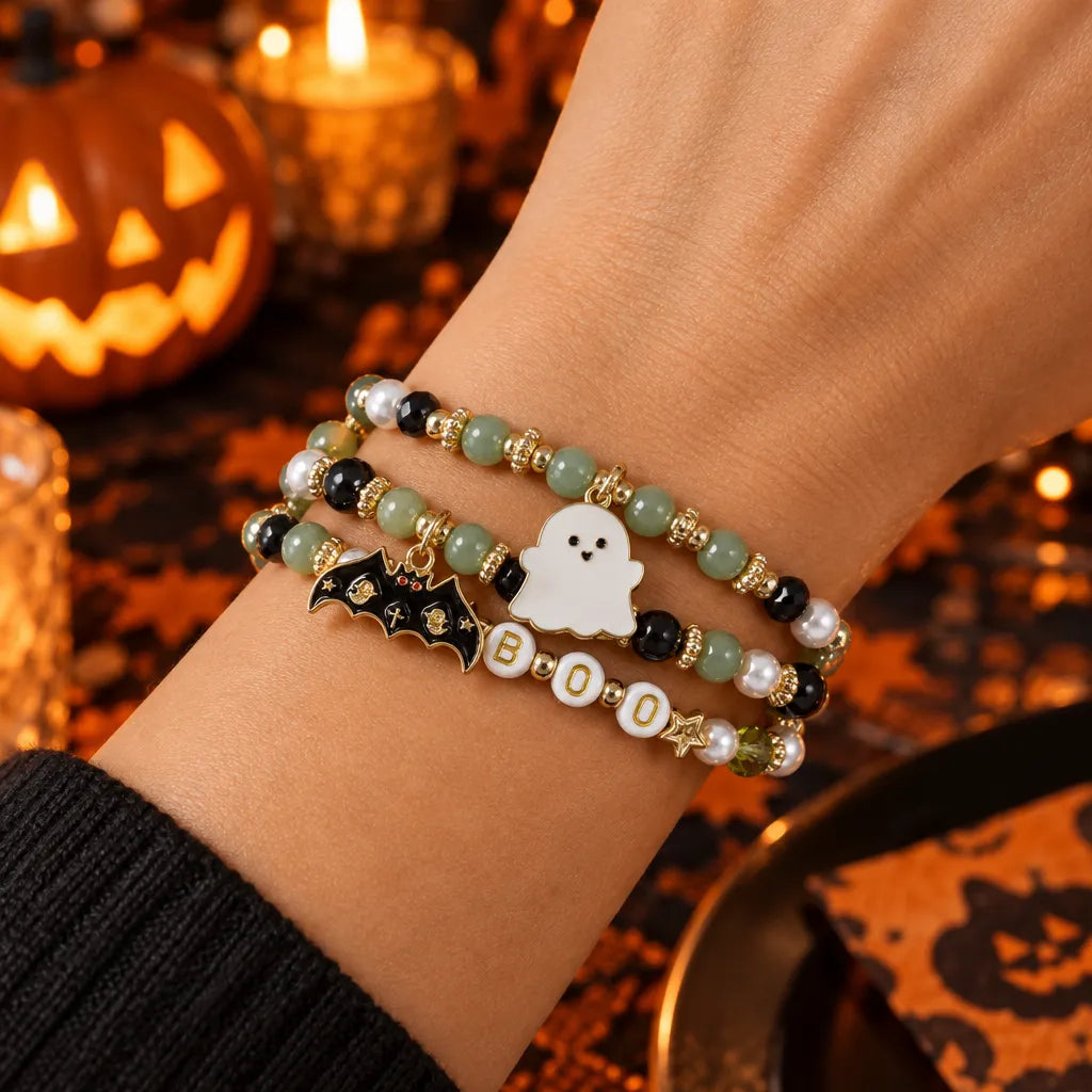 Spooky charm Halloween beaded bracelet – pumpkin, ghost and skull pendant jewelry