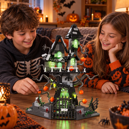 Children enjoying a completed pumpkin haunted house block set