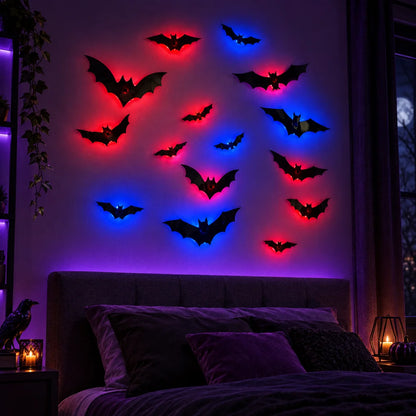 Black bat wall decals with red and blue LED backlighting, displayed on a bedroom wall above a bed.